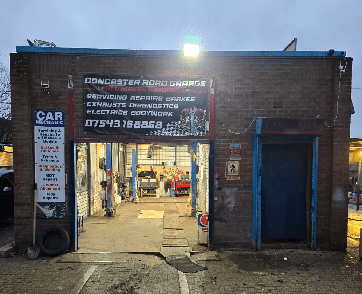 Mechanic working on a car